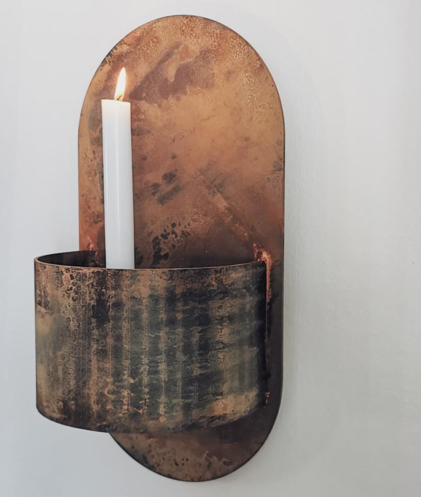 Blickfång-ruka-vas-ljusstake
